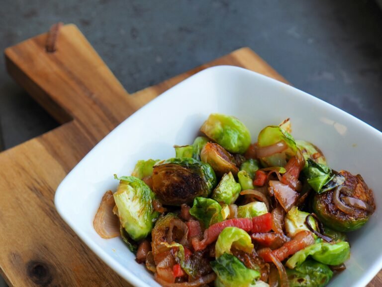 Warm Shredded Brussels Sprout & Bacon Salad with Whole-Wheat Croutons